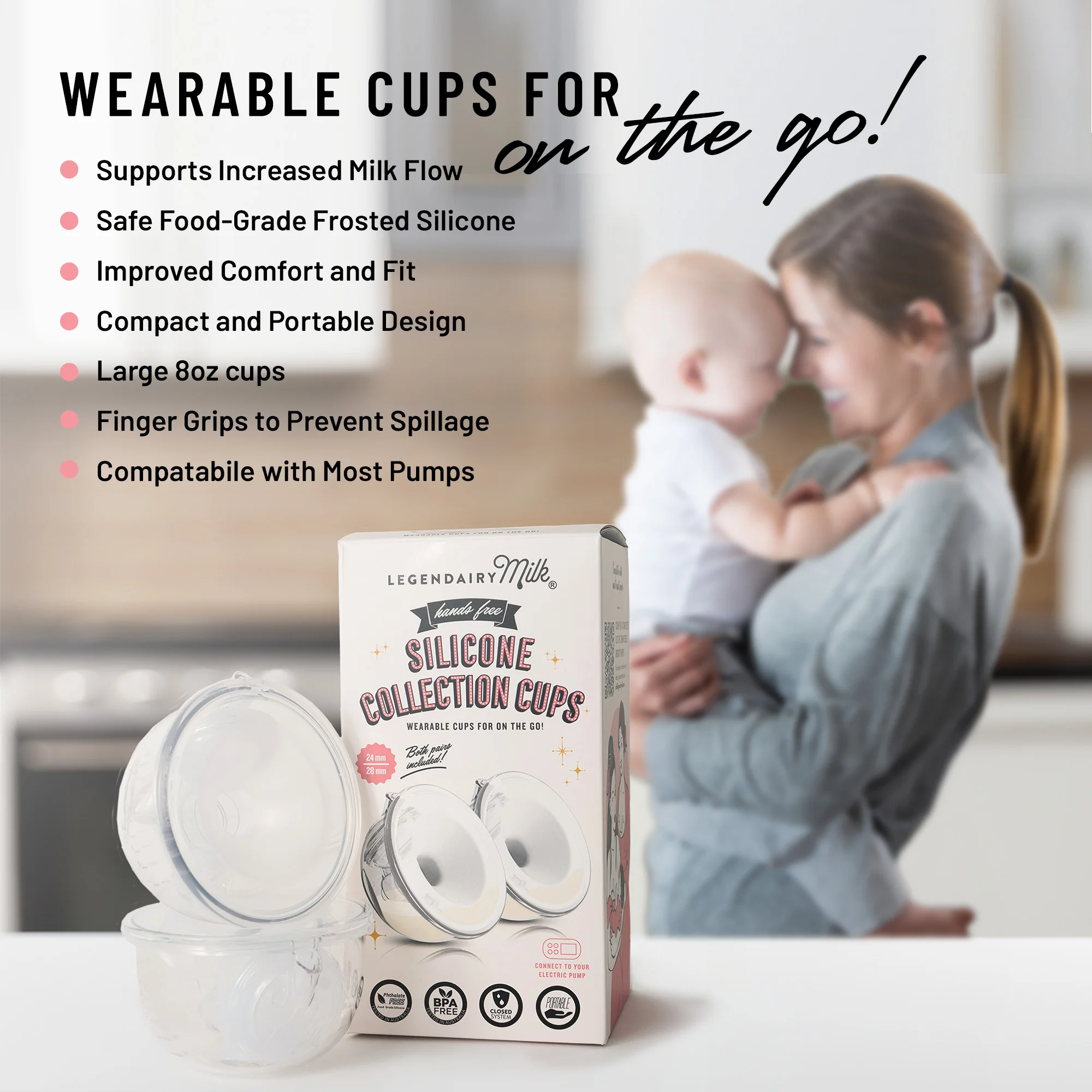 A mom holding her baby while wearing the Legendairy Milk silicone collection cups