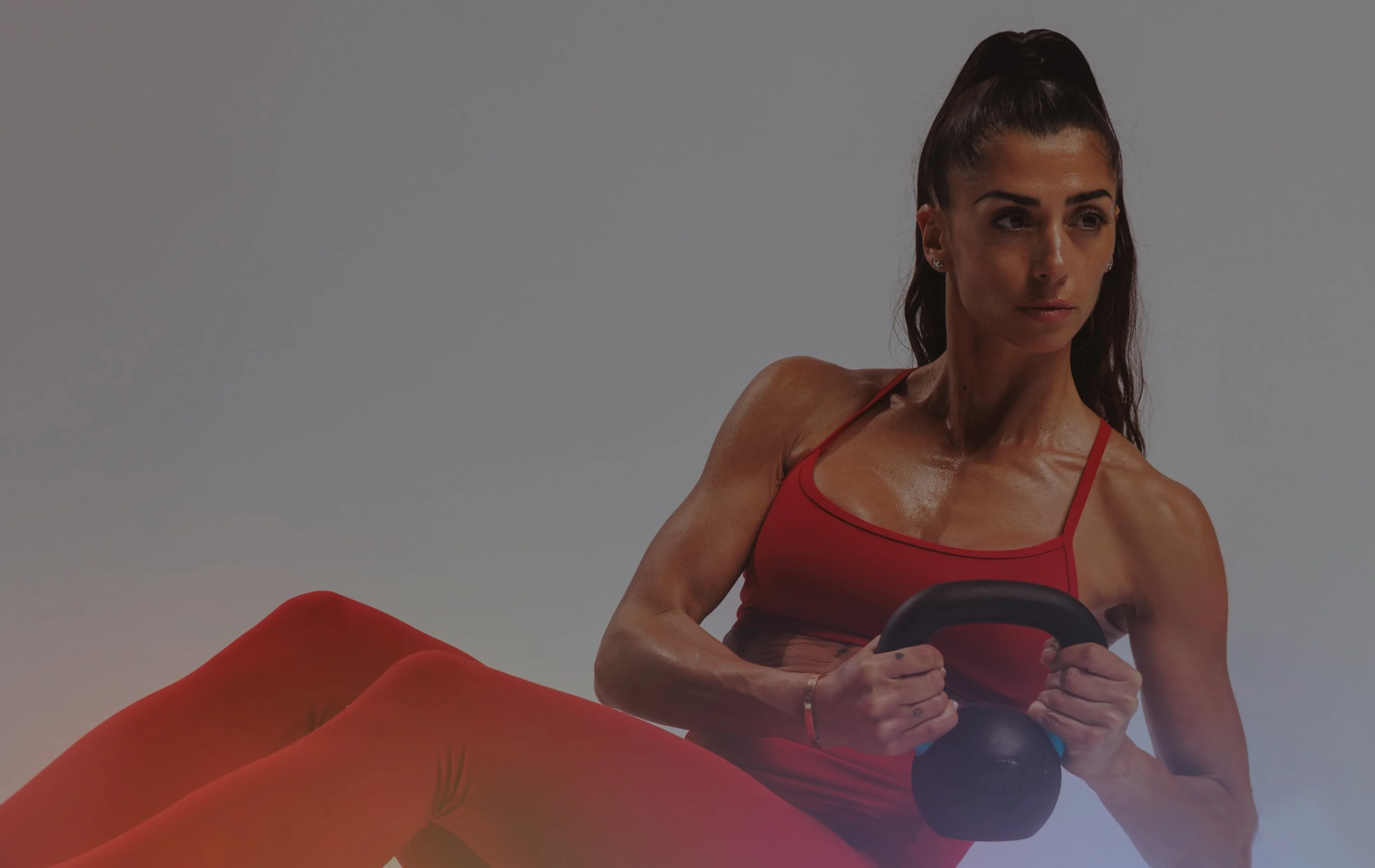 A Future member mid-set with a kettlebell
